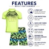 image:imageBody Glove Boys 2 Piece Swim Set Rash Guard amp Swim Trunks Sizes 412  UPF 50 Sun Protection QuickDry Lightweight Fabric for Beach and Pool Days Matching Print Stretch Comfort Fit for KidsGreen NeonPalm Trees